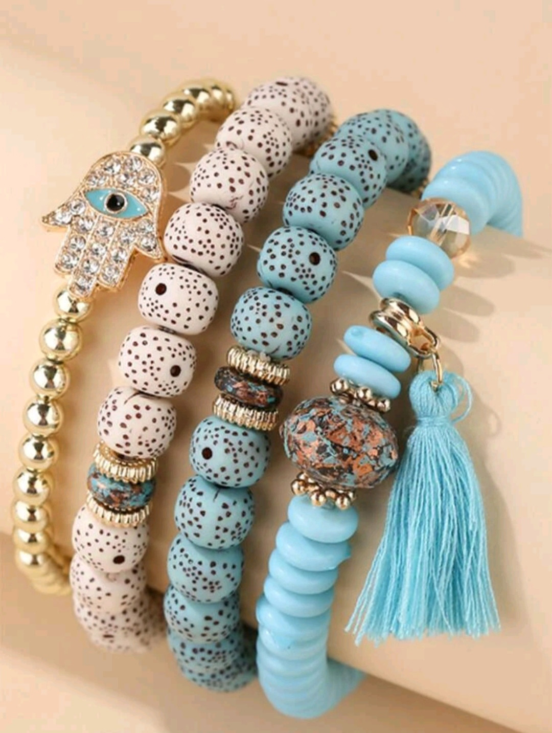 Lot de 4 bracelets à perles multicouches avec pendentif en forme de main de Hamsa et pompon en strass